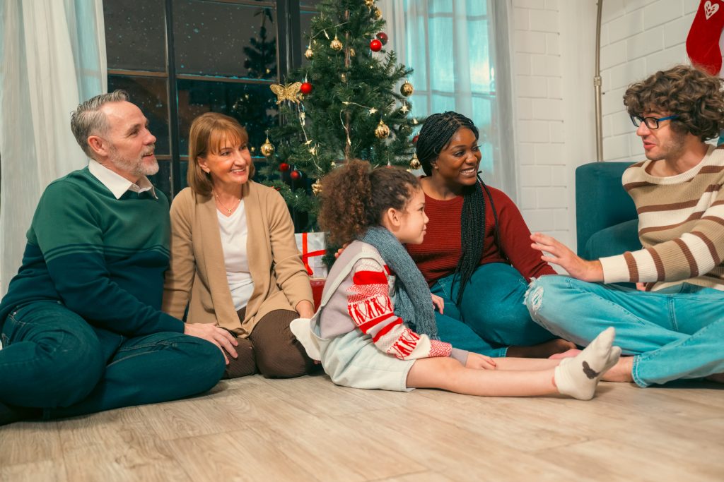 Festive Family Fun, A Joyful Christmas Moment with Loved Ones by the Twinkling Tree, happy family celebration at home