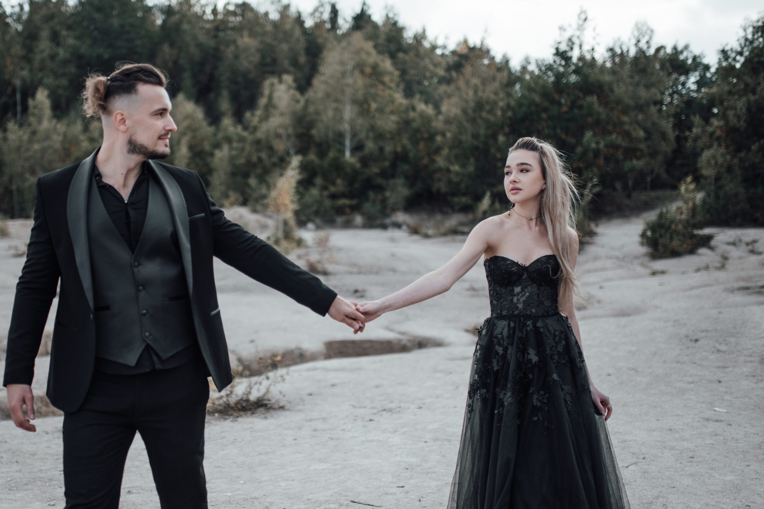 bride and groom in black wedding dress