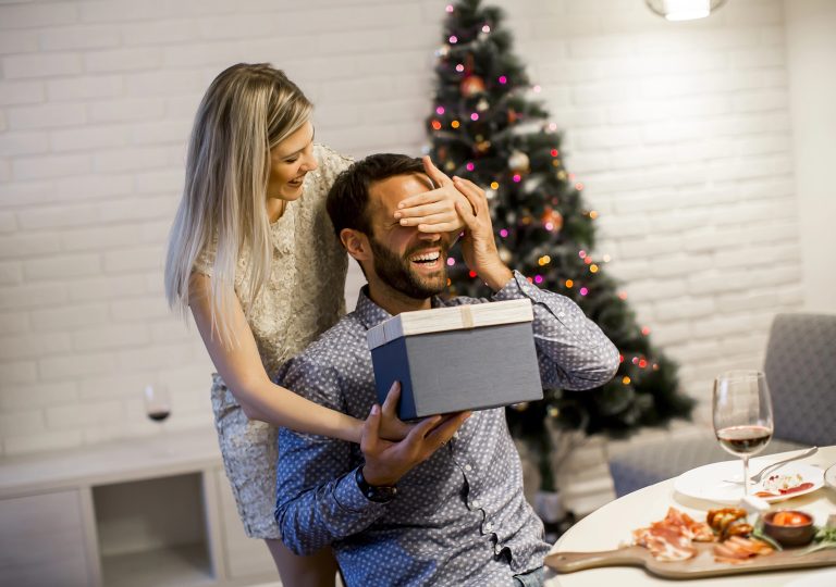 man getting surprise gift