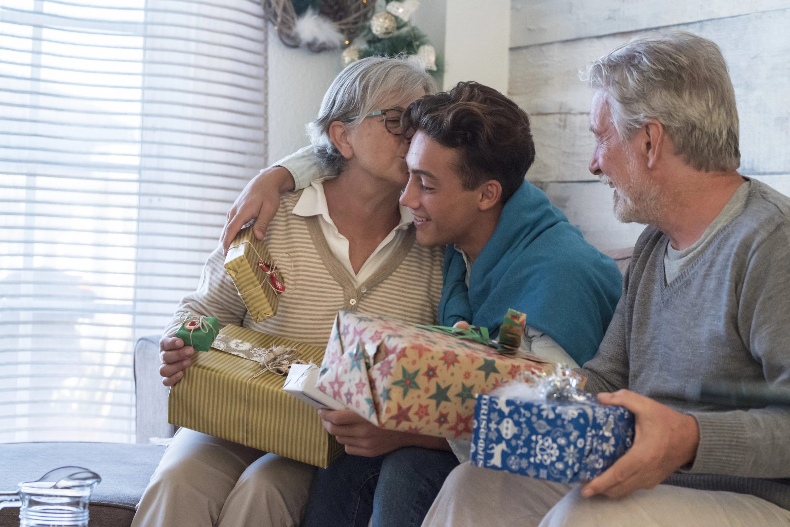grandma getting gift from grandson