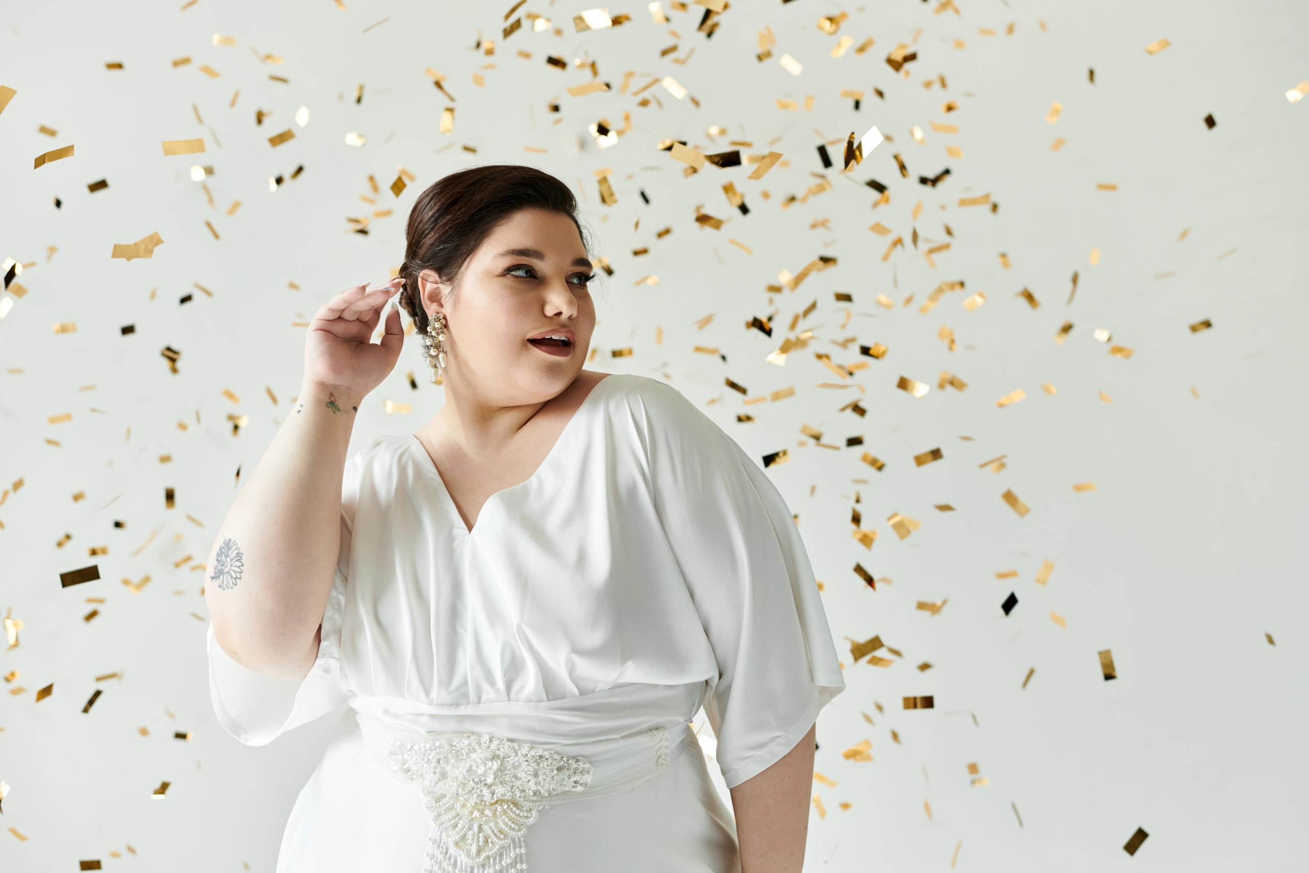 plus size woman in elegant white wedding dress