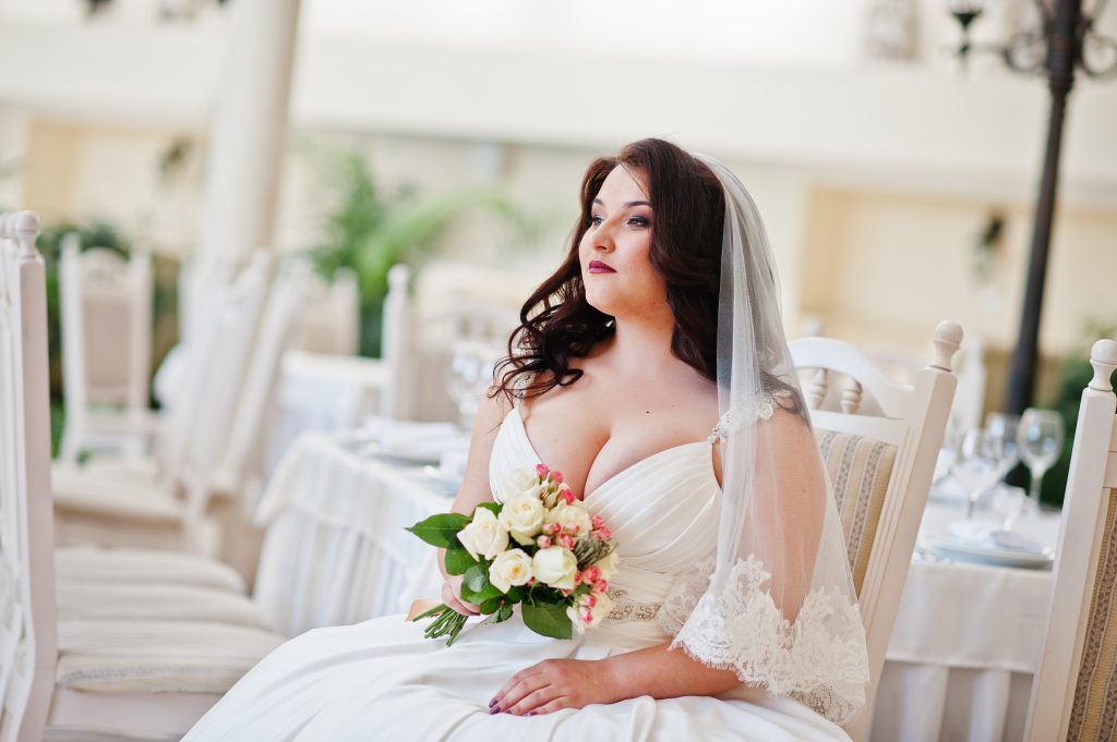 beautiful bride in plus-size wedding dress