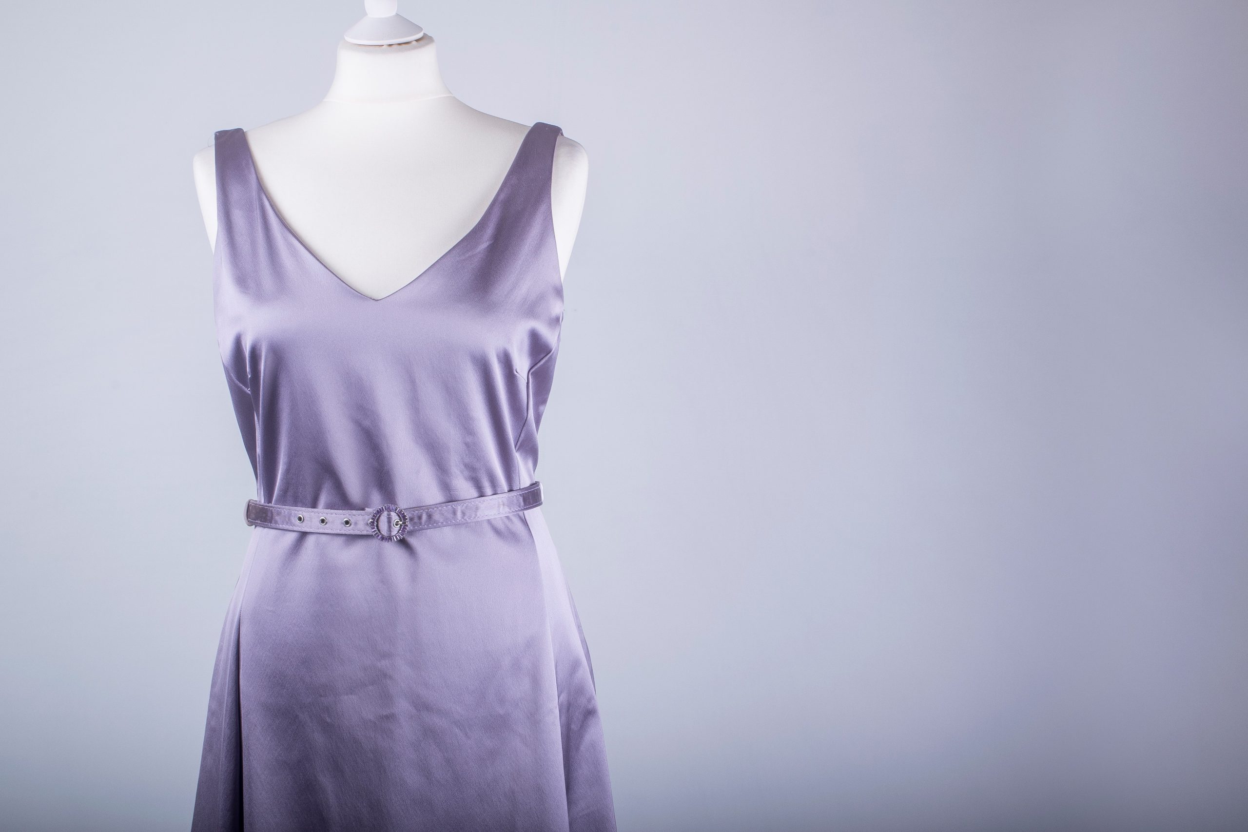 A Tailors Mannequin dressed in a Lilac Satin Dress