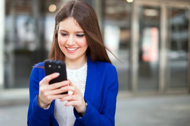 happy young woman using myregistry phone app