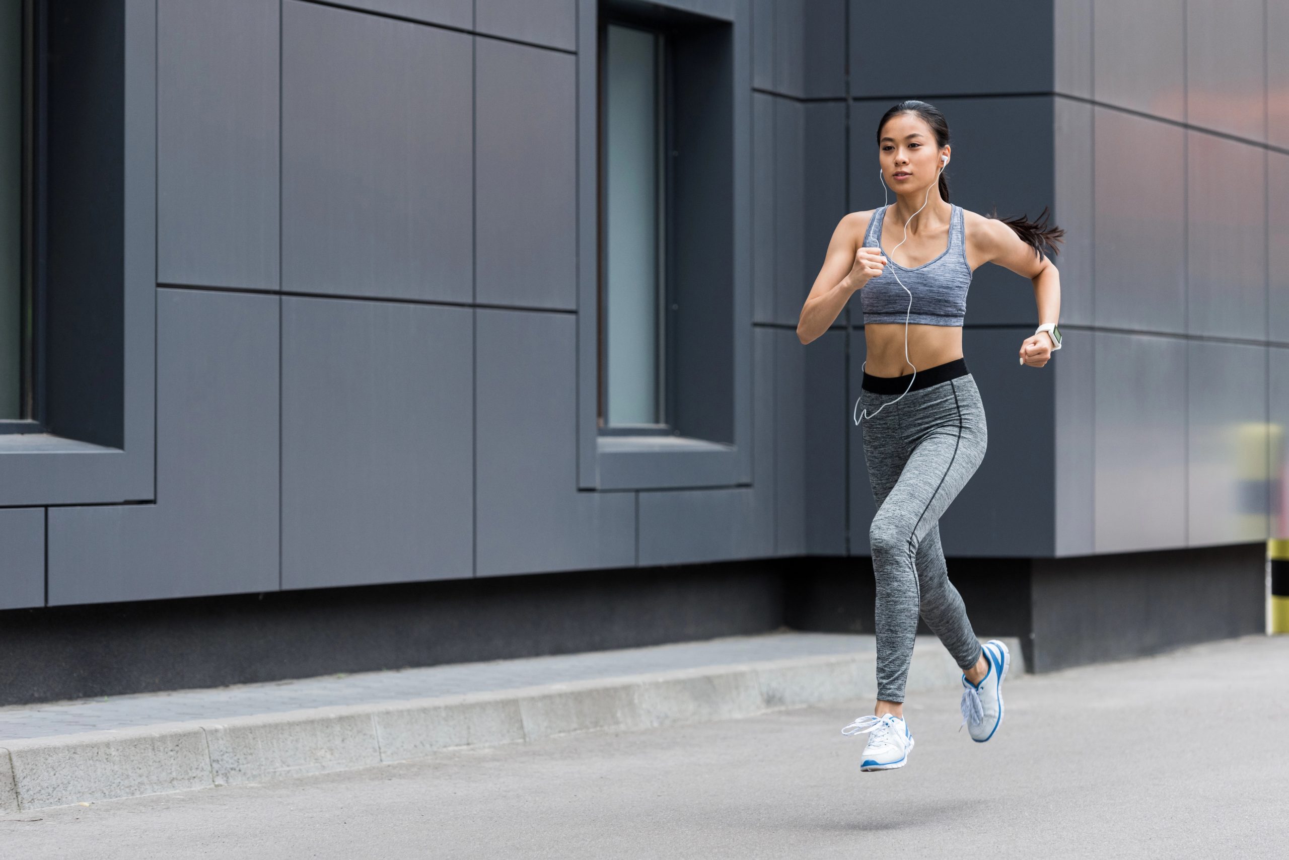 woman running in city
