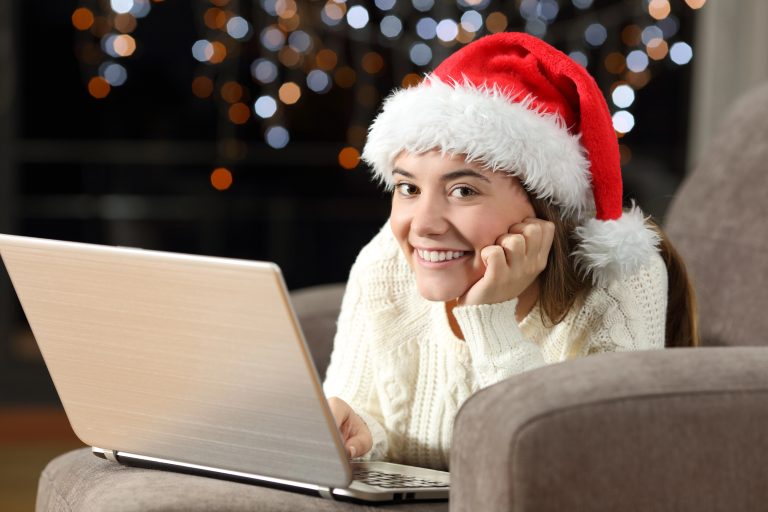 girl tracking gift registry on computer
