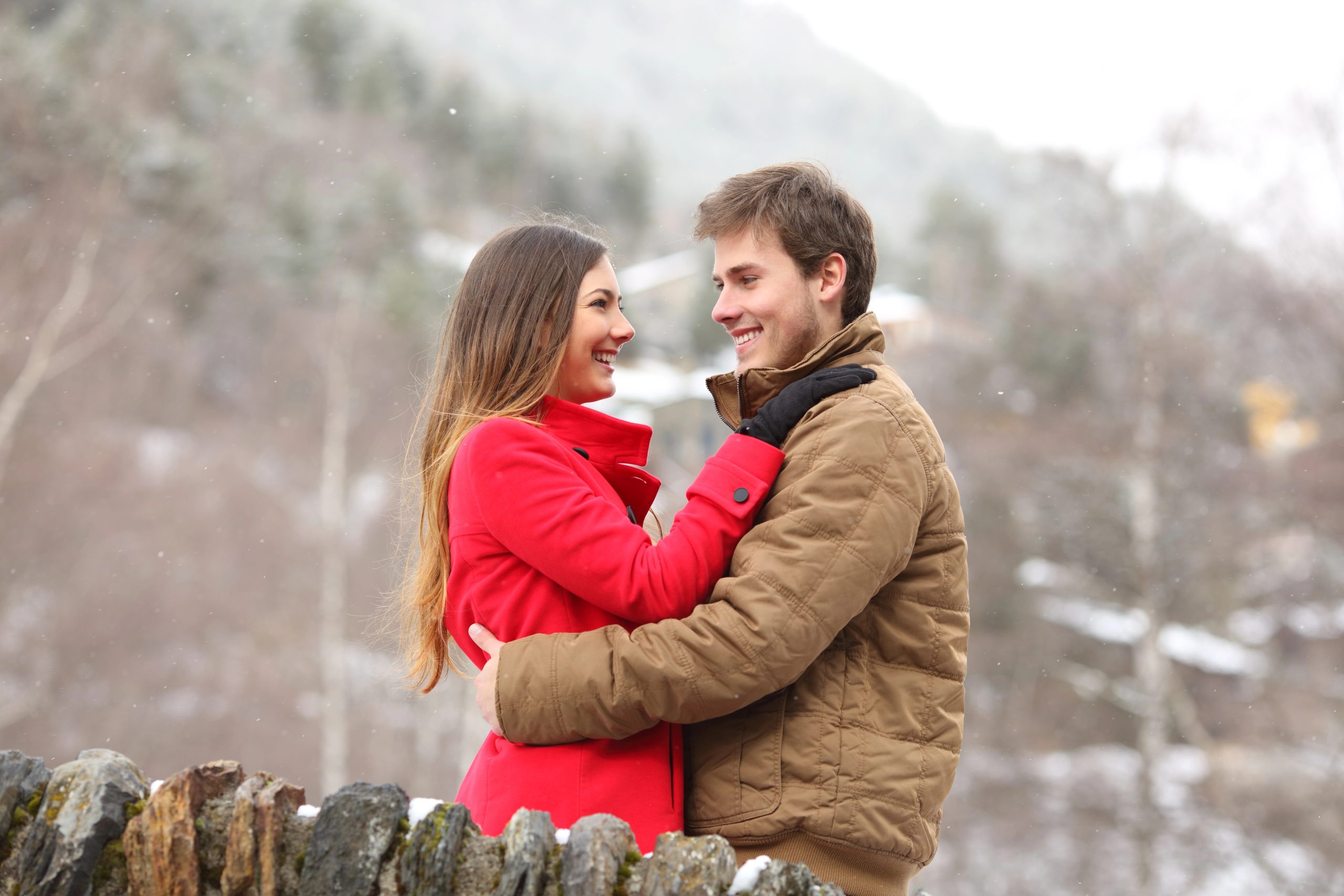 beautiful couple on christmas getaway in mountains