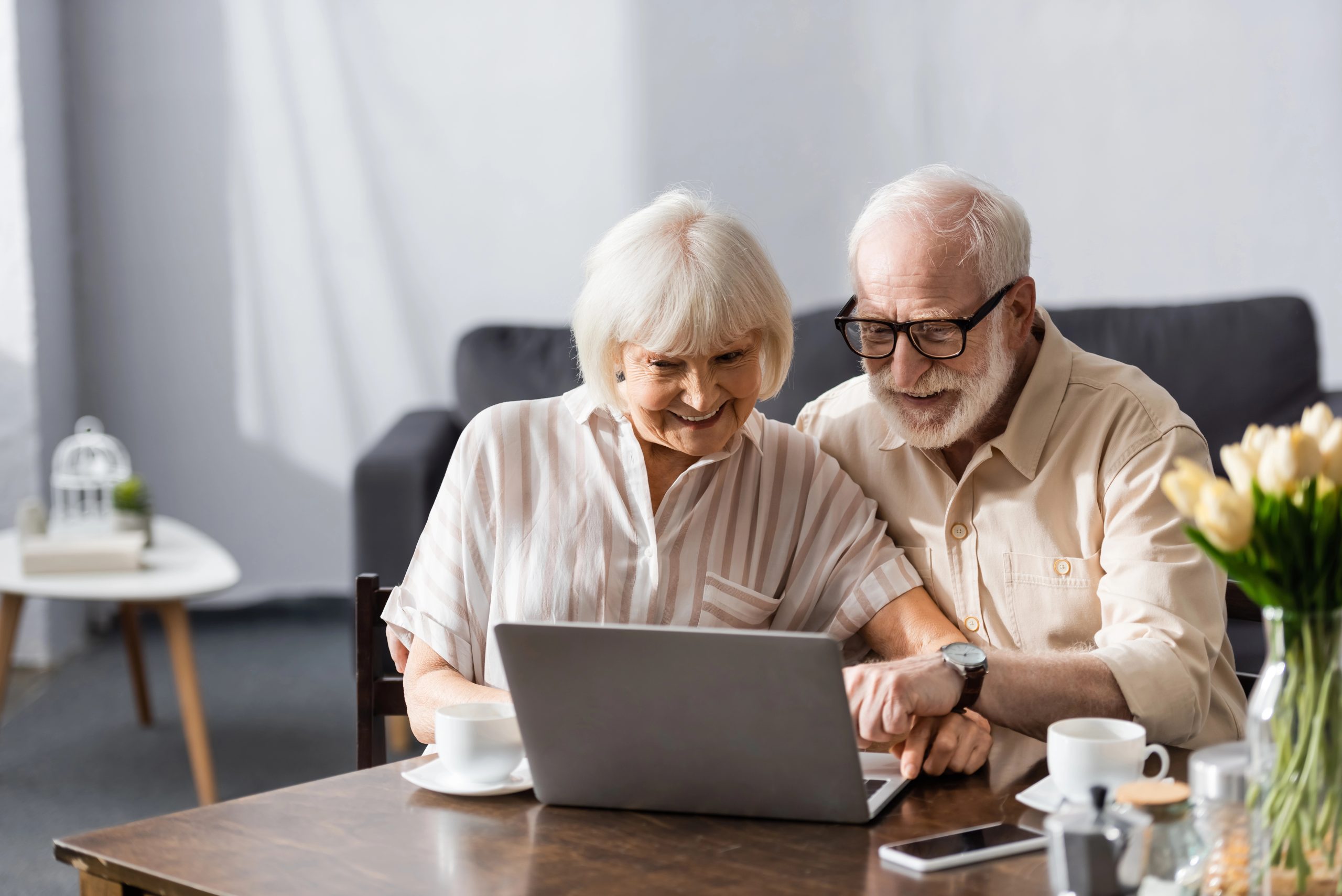 old couple working on gift registry together