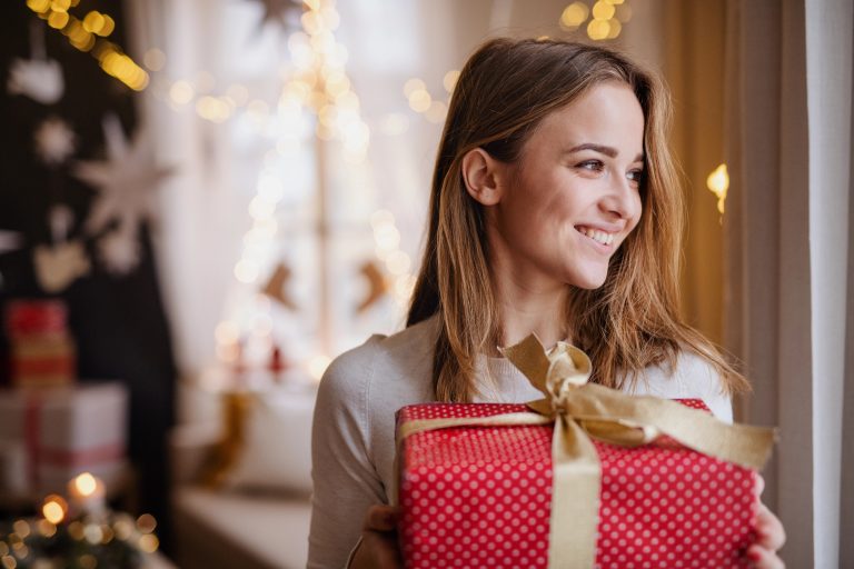 teen girl smiling with nice gift