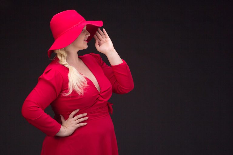 woman with elegant red plus size holiday dress