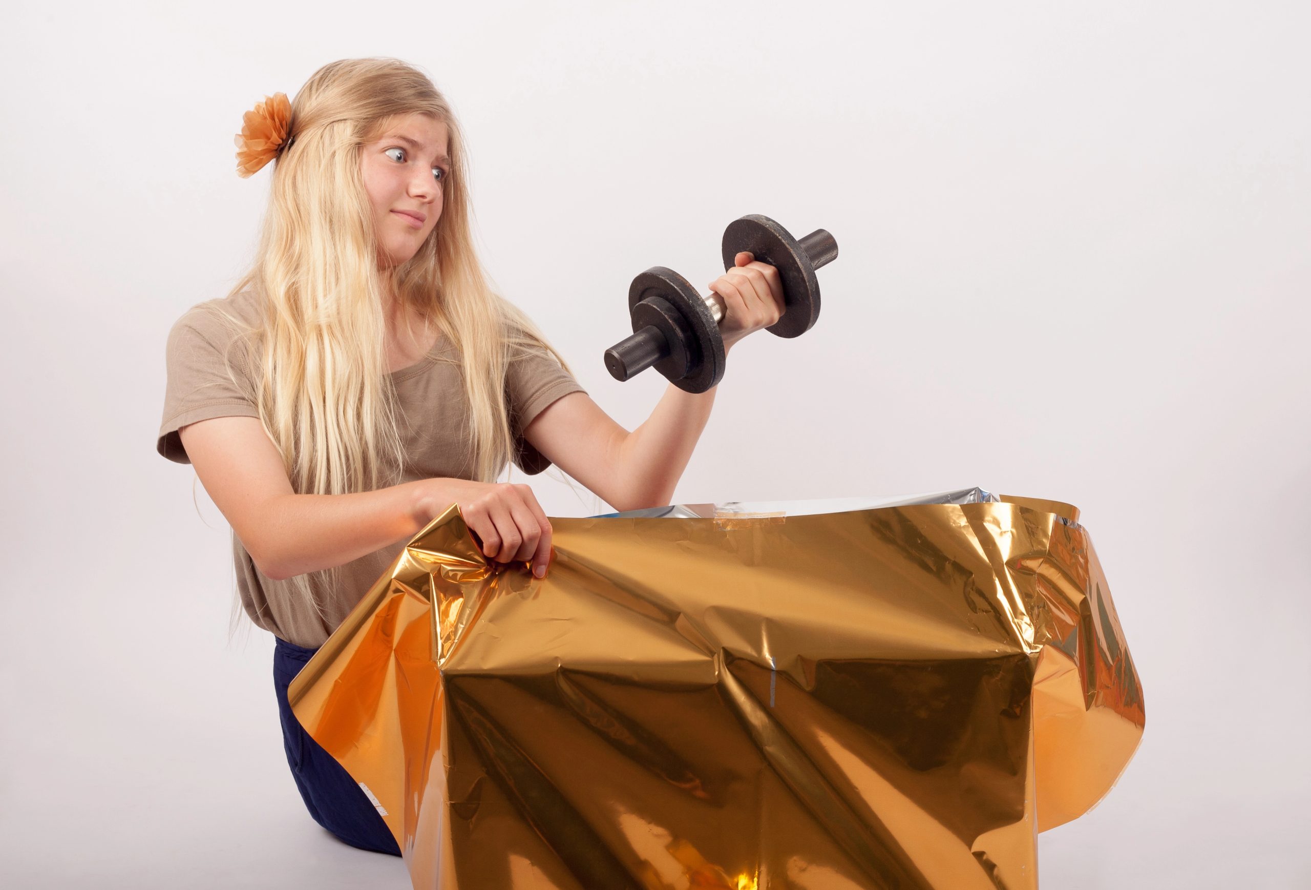 woman getting barbell for christmas gift she didnt want