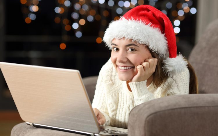 girl tracking gift registry on computer