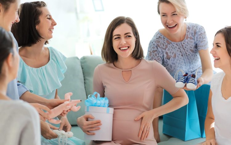 happy pregnant woman at baby sprinkle party