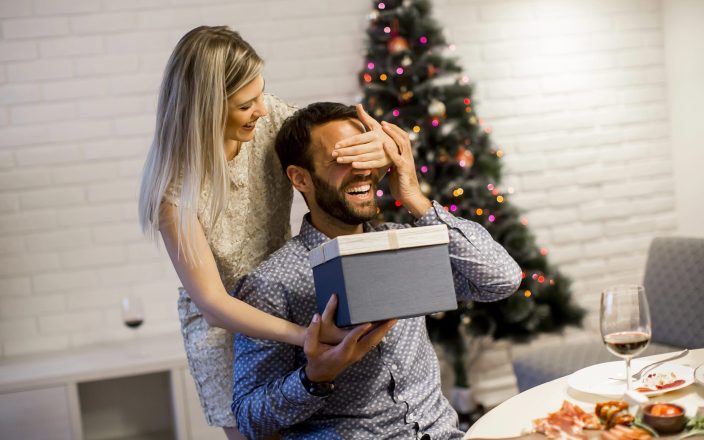 man getting surprise gift