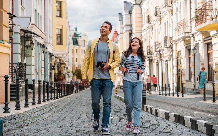 young couple exploring europe