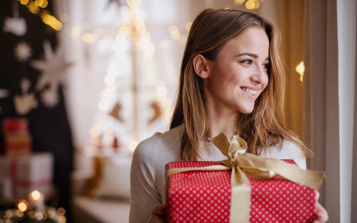 teen girl smiling with nice gift