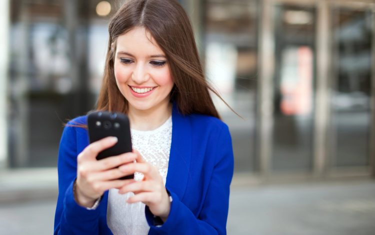 happy young woman using myregistry phone app